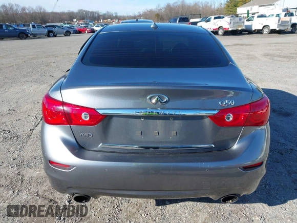 2015 Infiniti Q50 z VIN JN1BV7AR0FM397309, wystawiony jako IAAI lot #41752569 z przebiegiem 116 475 mil mil oraz . Historia ofert i sprzedaży dostępna na DreamBid. Obrazek 16.