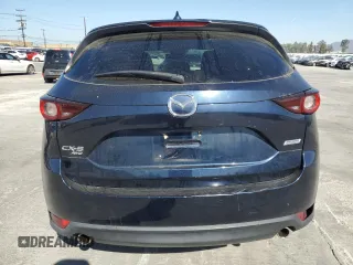 2019 Mazda CX-5 Touring with VIN JM3KFBCM0K0697813, listed as a Copart auction lot 52239505 with 49,844 mi miles and Salvage Title. Bid and sale history available at carsss.com. Image 6.