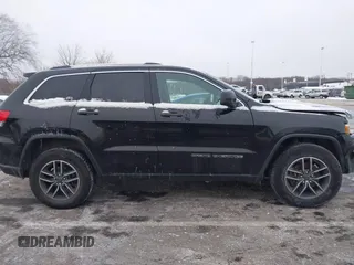 2019 Jeep Grand Cherokee Laredo E with VIN 1C4RJFAGXKC834233, listed as a IAAI auction lot 41392437 with 81,005 mi miles. Bid and sale history available at carsss.com. Image 14.