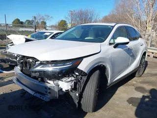 2023 Lexus RX 350 with VIN 2T2BAMCA3PC016934, listed as a IAAI auction lot 41465245 with 11,976 mi miles and . Bid and sale history available at DreamBid. Image 2.