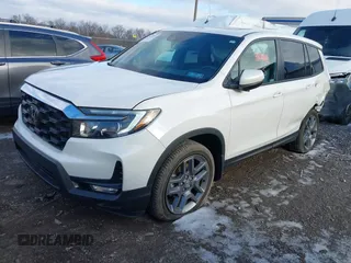 2023 Honda Passport EX-L with VIN 5FNYF8H50PB041370, listed as a IAAI auction lot 41536255 with 15,427 mi miles and . Bid and sale history available at carsss.com. Image 17.