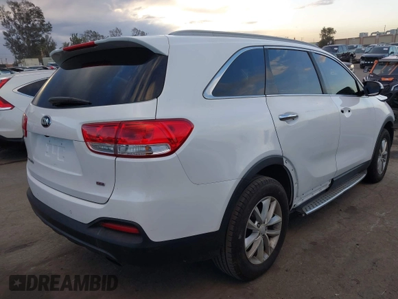 2016 Kia Sorento LX with VIN 5XYPG4A38GG075284, listed as a IAAI auction lot 41233974 with 126,044 mi miles. Bid and sale history available at carsss.com. Image 4.