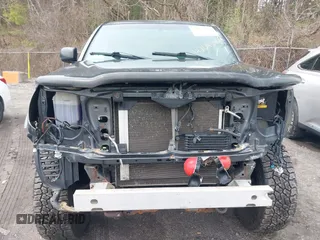 2011 Toyota Tacoma with VIN 3TMLU4EN1BM067901, listed as a IAAI auction lot 42043408 with 186,499 mi miles and . Bid and sale history available at carsss.com. Image 12.