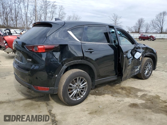 2017 Mazda CX-5 Touring with VIN JM3KFACLXH0195725, listed as a Copart auction lot 47464365 with 65,457 mi miles and Salvage Title. Bid and sale history available at carsss.com. Image 3.