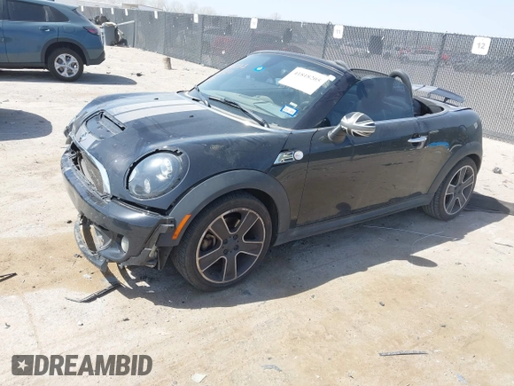 2012 MINI Roadster S with VIN WMWSY3C56CT144520, listed as a IAAI auction lot 41818205 with 86,836 mi miles and . Bid and sale history available at DreamBid. Image 17.