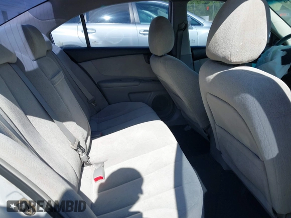 2008 Kia Optima LX z VIN KNAGE123385225909, wystawiony jako IAAI lot #42184219 z przebiegiem 118 300 mil mil oraz . Historia ofert i sprzedaży dostępna na DreamBid. Obrazek 8.