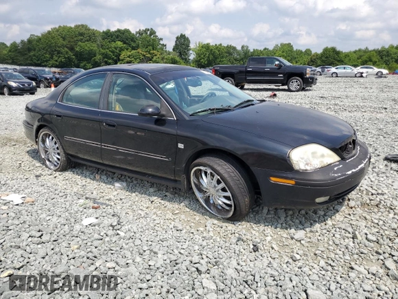 2002 Mercury Sable LS Premium with VIN 1MEHM55S02A621328, listed as a Copart auction lot 59556805 with 183,594 mi miles and Salvage title. Bid and sale history available at DreamBid. Image 4.