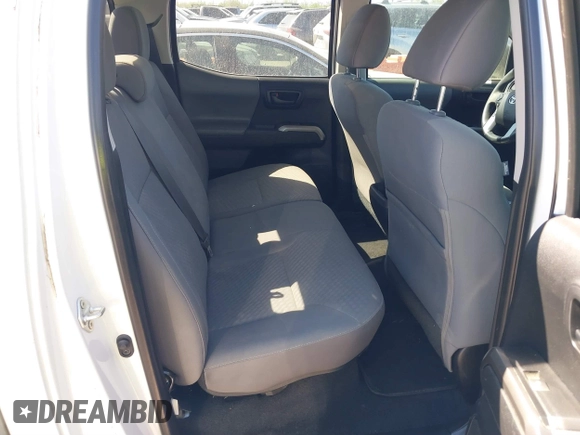 2021 Toyota Tacoma SR with VIN 3TYAX5GN6MT016452, listed as a IAAI auction lot 41816457 with 30,617 mi miles and . Bid and sale history available at DreamBid. Image 8.