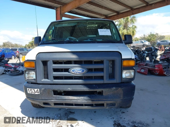 2014 Ford Econoline Cargo Commercial with VIN 1FTNE1EW1EDA66485, listed as a IAAI auction lot 41654271 with 304,974 mi miles and . Bid and sale history available at DreamBid. Image 12.