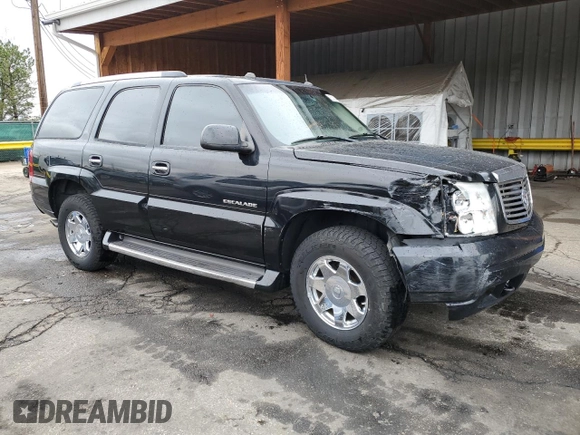 2004 Cadillac Escalade z VIN 1GYEK63N74R232309, wystawiony jako Copart lot #53099795 z przebiegiem 222 698 mil mil oraz Szkoda całkowita • Salvage title. Historia ofert i sprzedaży dostępna na DreamBid. Obrazek 4.
