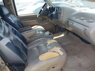1996 GMC Yukon with VIN 1GKEK13R2TJ746811, listed as a IAAI auction lot 41955840 with 2,242,108 mi miles. Bid and sale history available at carsss.com. Image 5.