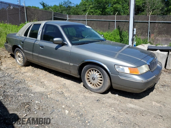 2000 Mercury Grand Marquis LS z VIN 2MEFM75W7YX694301, wystawiony jako Copart lot #57225295 z przebiegiem 141 420 mil mil oraz Szkoda całkowita • Salvage title. Historia ofert i sprzedaży dostępna na DreamBid. Obrazek 4.
