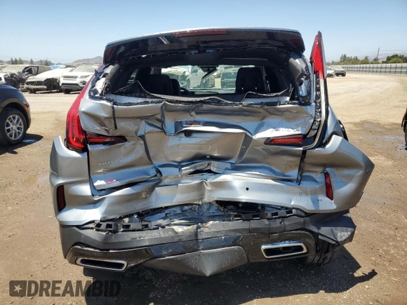 2024 Cadillac XT4 AWD Premium Luxury with VIN 1GYFZDR48RF153128, listed as a Copart auction lot 60712485 with 14,765 mi miles and Salvage title. Bid and sale history available at DreamBid. Image 6.