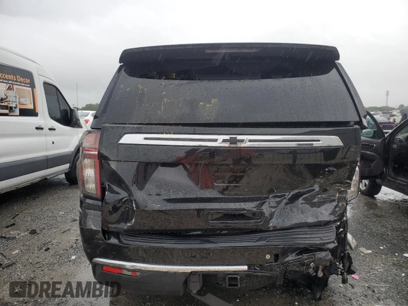 2021 Chevrolet Tahoe LS with VIN 1GNSCMKD4MR335973, listed as a Copart auction lot 69972594 with 42,129 mi miles and Salvage title. Bid and sale history available at DreamBid. Image 6.