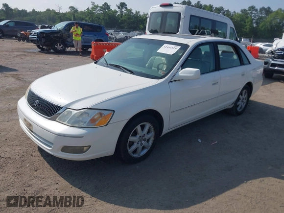 2000 Toyota Avalon XL z VIN 4T1BF28B2YU102103, wystawiony jako IAAI lot #42441529 z przebiegiem 256 568 mil mil oraz . Historia ofert i sprzedaży dostępna na DreamBid. Obrazek 2.