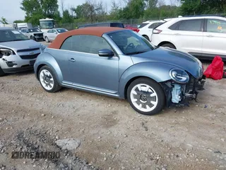 2019 Volkswagen Beetle S with VIN 3VW5DAAT1KM505762, listed as a IAAI auction lot 42636158 with 29,900 mi miles and . Bid and sale history available at DreamBid. Image 1.