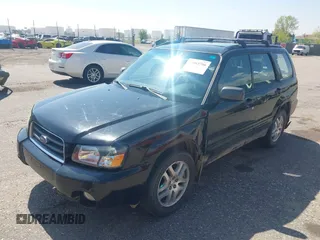 2003 Subaru Forester XS with VIN JF1SG65633H730386, listed as a IAAI auction lot 42084706 with 199,602 mi miles. Bid and sale history available at carsss.com. Image 2.