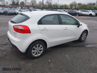 2013 Kia Rio SX with VIN KNADN5A34D6245263, listed as a IAAI auction lot 41976166 with 101,438 mi miles. Bid and sale history available at carsss.com. Image 4.
