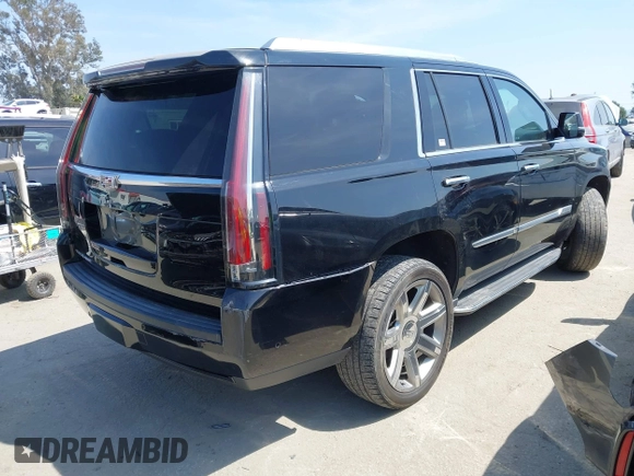 2020 Cadillac Escalade Luxury with VIN 1GYS3BKJ0LR129965, listed as a IAAI auction lot 42084752 with 133,390 mi miles and . Bid and sale history available at DreamBid. Image 4.