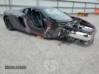 2016 McLaren 650S z VIN SBM11FAA5GW006080, wystawiony jako Copart lot #48061065 z przebiegiem 36 645 mil mil oraz Szkody całkowita. Historia ofert i sprzedaży dostępna na DreamBid. Obrazek 4.