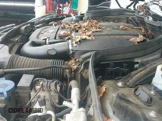 2014 Mercedes-Benz C 250 с VIN WDDGJ4HB5EG289213, выставлен на аукционе IAAI как лот 42933366 с пробегом 125 396 миль миль и . История ставок и продаж доступна на DreamBid. Изображение 12.