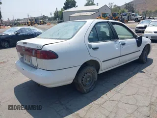 1996 Nissan Sentra XE z VIN 1N4AB41D3TC716326, wystawiony jako IAAI lot #42455181 z przebiegiem 235 076 mil mil oraz . Historia ofert i sprzedaży dostępna na DreamBid. Obrazek 4.