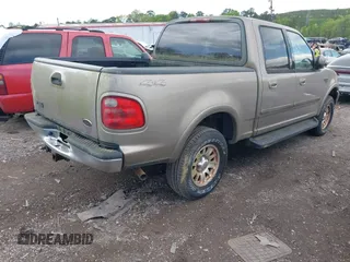 2003 Ford F-150 XLT with VIN 1FTRW08L63KD06455, listed as a IAAI auction lot 41988549 with 138,168 mi miles. Bid and sale history available at carsss.com. Image 4.