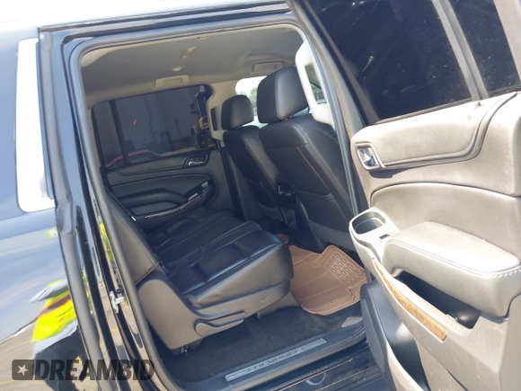 2018 Chevrolet Suburban LT z VIN 1GNSCHKC7JR111560, wystawiony jako IAAI lot #41823175 z przebiegiem 136 751 mil mil oraz . Historia ofert i sprzedaży dostępna na DreamBid. Obrazek 8.