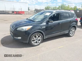 2014 Ford Escape Titanium with VIN 1FMCU9JX2EUB66579, listed as a IAAI auction lot 42171374 with 131,485 mi miles. Bid and sale history available at carsss.com. Image 17.