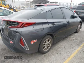 2018 Toyota Prius Plus with VIN JTDKARFP5J3095377, listed as a IAAI auction lot 42153552 with 77,255 mi miles and . Bid and sale history available at DreamBid. Image 4.