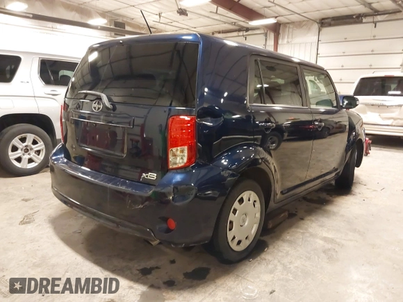 2015 Scion xB with VIN JTLZE4FE7FJ071481, listed as a IAAI auction lot 41520058 with 175,714 mi miles. Bid and sale history available at carsss.com. Image 4.