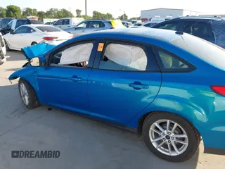 2016 Ford Focus SE with VIN 1FADP3F2XGL387131, listed as a IAAI auction lot 41992802 with 112,274 mi miles and . Bid and sale history available at DreamBid. Image 14.