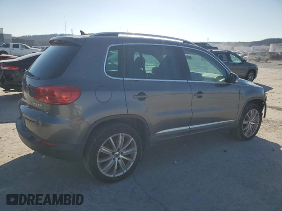 2012 Volkswagen Tiguan SE with VIN WVGAV7AX8CW080123, listed as a Copart auction lot 88922235 with 159,093 mi miles and Salvage Title. Bid and sale history available at DreamBid. Image 3.