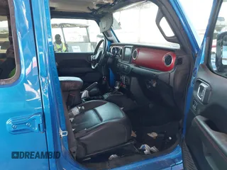 2021 Jeep Gladiator Rubicon with VIN 1C6JJTBGXML516164, listed as a IAAI auction lot 41837544 with 48,197 mi miles and . Bid and sale history available at DreamBid. Image 5.