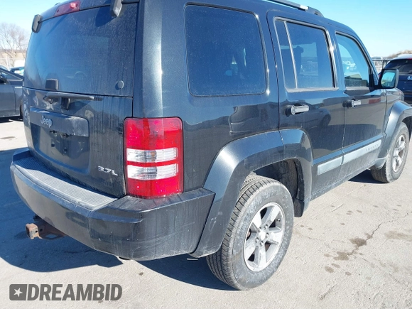 2008 Jeep Liberty Sport with VIN 1J8GP28K38W227910, listed as a IAAI auction lot 41244738 with 215,126 mi miles. Bid and sale history available at carsss.com. Image 4.