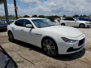 2014 Maserati Ghibli S Q4 z VIN ZAM57RTA1E1126438, wystawiony jako Copart lot #58388215 z przebiegiem 95 167 mil mil oraz Tytuł czysty. Historia ofert i sprzedaży dostępna na DreamBid. Obrazek 4.
