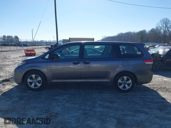 2014 Toyota Sienna L with VIN 5TDZK3DC3ES506658, listed as a IAAI auction lot 41469391 with 169,848 mi miles. Bid and sale history available at carsss.com. Image 14.