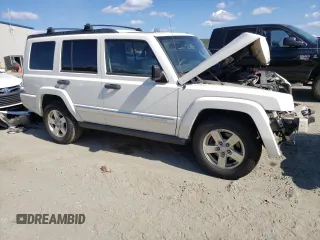 2006 Jeep Commander with VIN 1J8HG48N26C123370, listed as a Copart auction lot 42310645 with 94,985 mi miles and Salvage title. Bid and sale history available at DreamBid. Image 4.