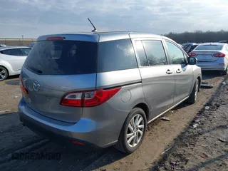 2012 Mazda 5 Sport with VIN JM1CW2BL1C0115788, listed as a IAAI auction lot 41770484 with 154,182 mi miles. Bid and sale history available at carsss.com. Image 4.