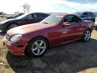 2001 Mercedes-Benz SLK-Class with VIN WDBKK65FX1F213795, listed as a Copart auction lot 43669765 with 109,396 mi miles and Salvage Title. Bid and sale history available at carsss.com. Image 1.