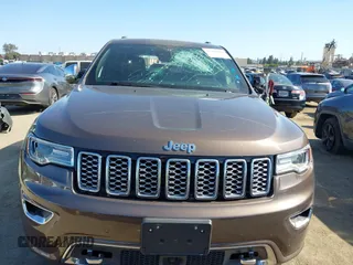 2017 Jeep Grand Cherokee Overland z VIN 1C4RJECG0HC960178, wystawiony jako IAAI lot #42315844 z przebiegiem 63 271 mil mil oraz . Historia ofert i sprzedaży dostępna na DreamBid. Obrazek 12.