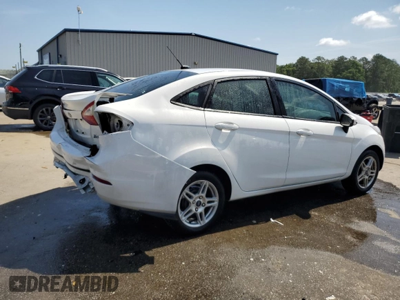2019 Ford Fiesta SE z VIN 3FADP4BJ2KM147288, wystawiony jako Copart lot #55391125 z przebiegiem 83 887 mil mil oraz Szkoda całkowita • Salvage title. Historia ofert i sprzedaży dostępna na DreamBid. Obrazek 3.