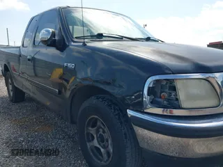 1997 Ford F-150 XL z VIN 1FTEX17L8VNB96786, wystawiony jako IAAI lot #42284370 z przebiegiem 163 227 mil mil oraz . Historia ofert i sprzedaży dostępna na DreamBid. Obrazek 6.