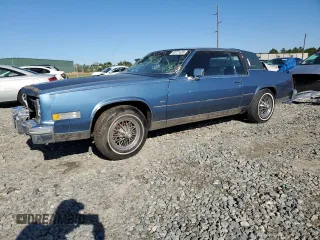 1981 Cadillac Eldorado z VIN 1G6AL5744BE616696, wystawiony jako Copart lot #50721635 z przebiegiem 11 139 mil mil oraz Tytuł czysty. Historia ofert i sprzedaży dostępna na DreamBid. Obrazek 1.