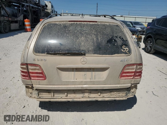 2003 Mercedes-Benz E-Class AWD with VIN WDBJH82J93X088042, listed as a Copart auction lot 70566864 with 167,374 mi miles and Salvage Title. Bid and sale history available at carsss.com. Image 6.