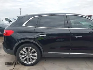 2018 Lincoln MKX Reserve with VIN 2LMPJ8LP3JBL18035, listed as a IAAI auction lot 42465412 with 114,157 mi miles and . Bid and sale history available at DreamBid. Image 19.