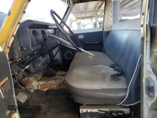 1974 Toyota Land Cruiser z VIN FJ5546419, wystawiony jako Copart lot #48010795 z przebiegiem 85 596 mil mil oraz Czysty tytuł • Clean title. Historia ofert i sprzedaży dostępna na DreamBid. Obrazek 7.
