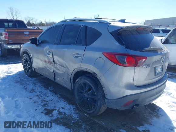2013 Mazda CX-5 Grand Touring with VIN JM3KE4DE4D0168115, listed as a IAAI auction lot 41610004 with 190,690 mi miles. Bid and sale history available at carsss.com. Image 3.