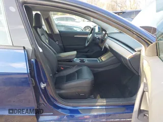 2023 Tesla Model 3 with VIN 5YJ3E1EA1PF655558, listed as a IAAI auction lot 41668827 with 68,778 mi miles and . Bid and sale history available at carsss.com. Image 5.