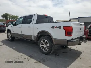 2019 Ford F-150 XL with VIN 1FTEW1E51KFB58751, listed as a Copart auction lot 50058755 with 102,411 mi miles and Salvage Title. Bid and sale history available at carsss.com. Image 2.